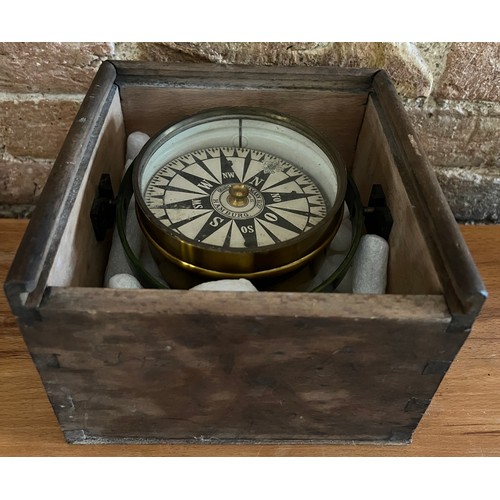 1284 - A gamble mounted ships compass in wood outer case, lacking lid. Case 18cm x 18cm. Maker Georg Hechel... 