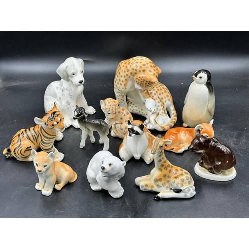 225 - Twelve ceramic animal figures stamped `Made in USSR' and two which are unstamped to include a goat, ... 