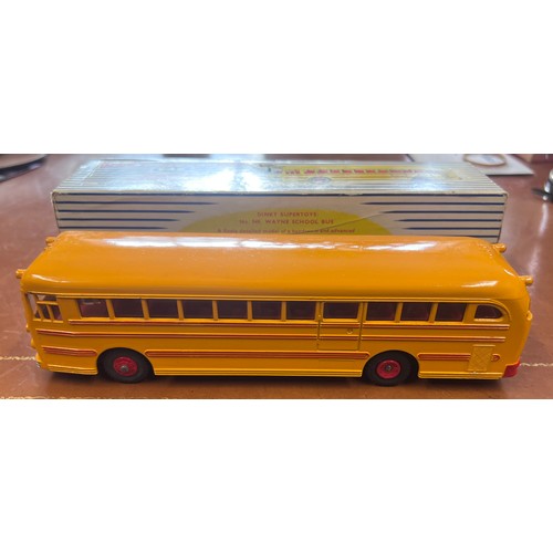 1114 - A Dinky Supertoys Wayne School Bus, 949. Yellow and red.