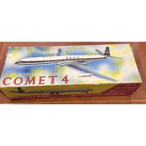 1151 - A boxed English Welsotoys tinplate De Havilland Comet 4 'B.O.A.C' aeroplane, circa 1950, with fricti... 