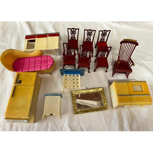 1153 - A Lundby Dolls House to include furniture by Marx, Tri-ang and various others some wooden. Approx 63... 