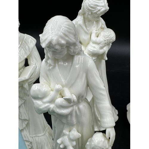 207 - A large collection of ceramic figurines to include Coalport Innocence, Here comes the Bride, Nell Gw... 