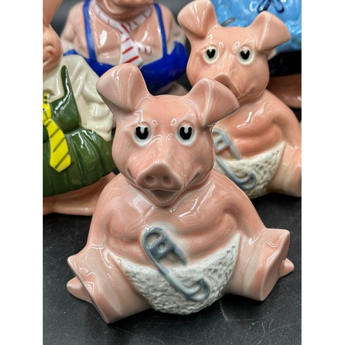 208 - Wade Natwest 19thC ceramic porcelain piggy banks to include two baby Woody, one Lady Hilary, two Ann... 