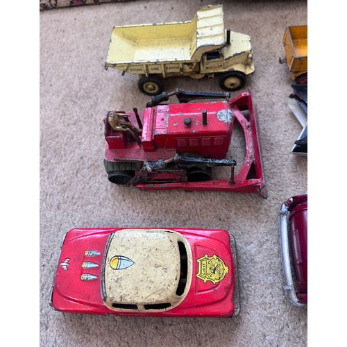 1155 - Diecast and tinplate toys to include Dinky Blaw Knox Bulldozer, Dinky Euclid Rear Dump Truck 965, Di... 