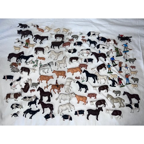 1158 - A large quantity of Britains farmyard & farmers animals to include Cows, Pigs, Sheep, Horses etc.