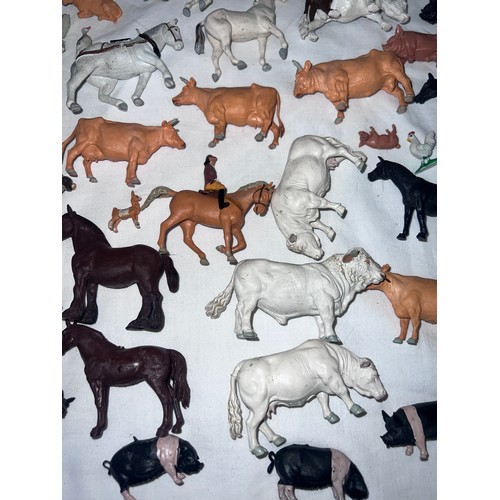 1158 - A large quantity of Britains farmyard & farmers animals to include Cows, Pigs, Sheep, Horses etc.