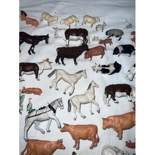 1158 - A large quantity of Britains farmyard & farmers animals to include Cows, Pigs, Sheep, Horses etc.