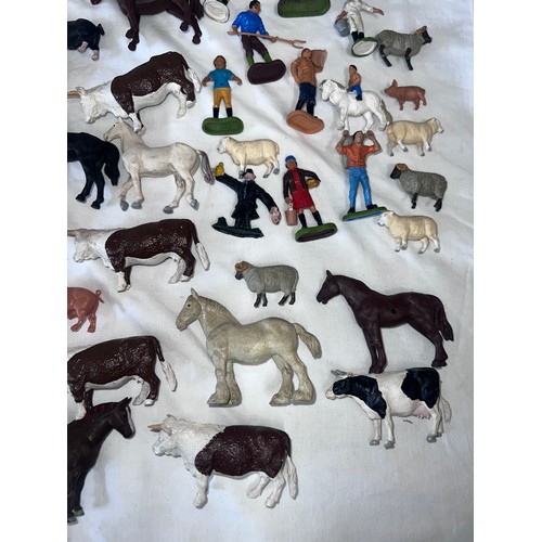 1158 - A large quantity of Britains farmyard & farmers animals to include Cows, Pigs, Sheep, Horses etc.