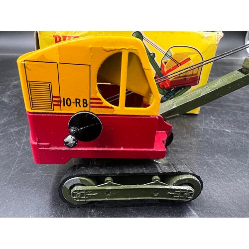 1164 - A boxed Ruston Bucyrus Working Model Excavator 10-RB. No.260. Finished in yellow and red, with dark ... 