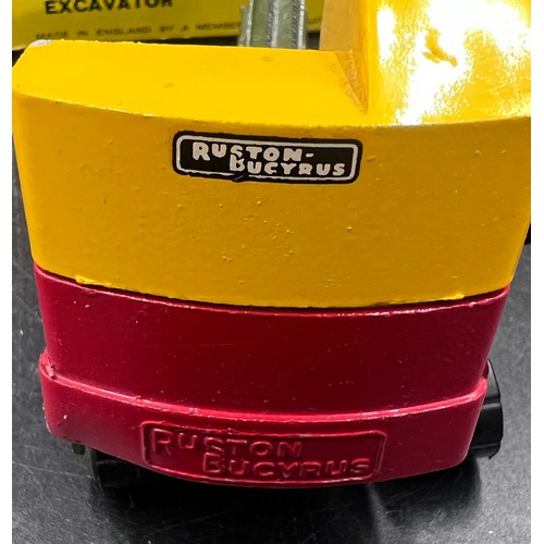 1164 - A boxed Ruston Bucyrus Working Model Excavator 10-RB. No.260. Finished in yellow and red, with dark ... 