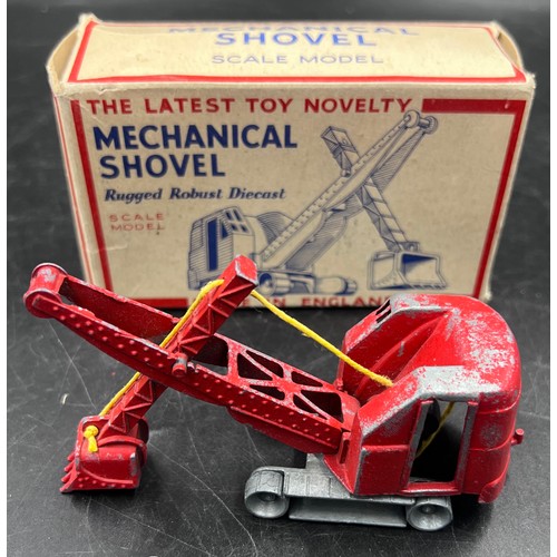 1167 - A boxed Made in England diecast model of a mechanical shovel finished in red. Original box.