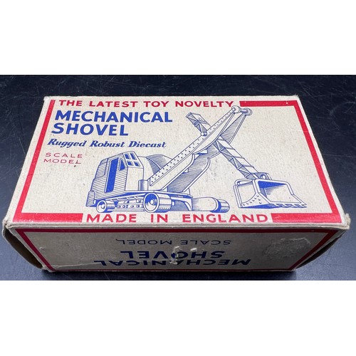 1167 - A boxed Made in England diecast model of a mechanical shovel finished in red. Original box.