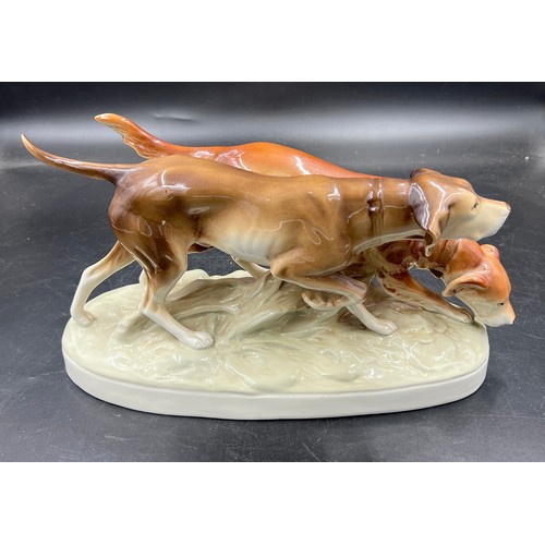 203 - A mid-20th century Royal Dux porcelain figure group of two hunting dogs, 36cm w.