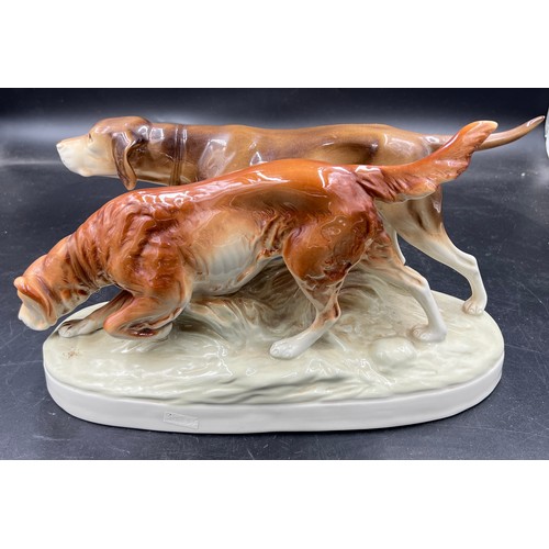 203 - A mid-20th century Royal Dux porcelain figure group of two hunting dogs, 36cm w.