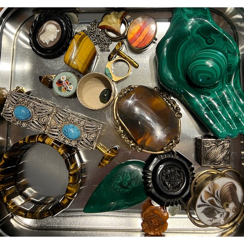 421 - A quantity of 19thC and 20thC costume jewelllery etc to include jet brooches, tigers eye bangle, cuf... 