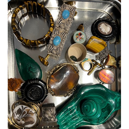 421 - A quantity of 19thC and 20thC costume jewelllery etc to include jet brooches, tigers eye bangle, cuf... 