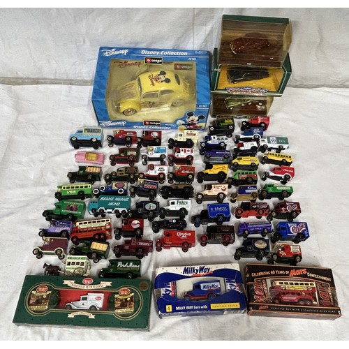 1150 - A collection of toy vehicles to include a boxed Disney Burago 1/18 scale beetle, Lledo vehicles, Mat... 