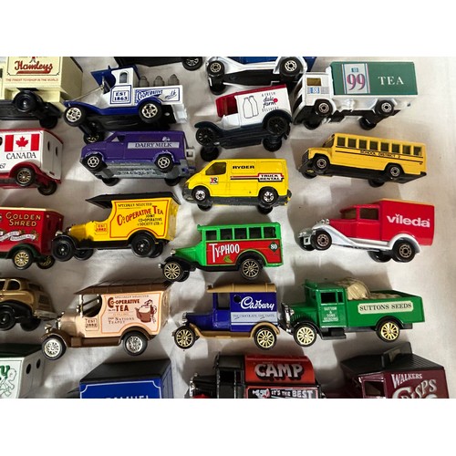 1150 - A collection of toy vehicles to include a boxed Disney Burago 1/18 scale beetle, Lledo vehicles, Mat... 