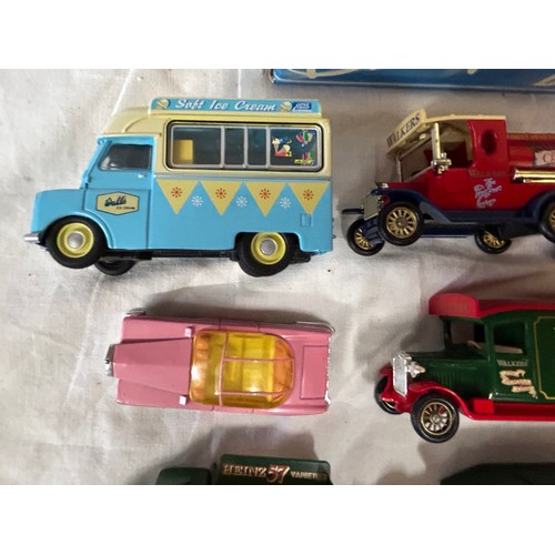 1150 - A collection of toy vehicles to include a boxed Disney Burago 1/18 scale beetle, Lledo vehicles, Mat... 