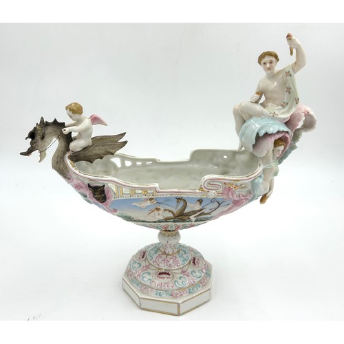 201 - A mixture of Continental ceramics to include a 19thC German boat shaped centre vase with dragon, che... 