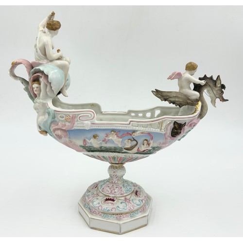 201 - A mixture of Continental ceramics to include a 19thC German boat shaped centre vase with dragon, che... 