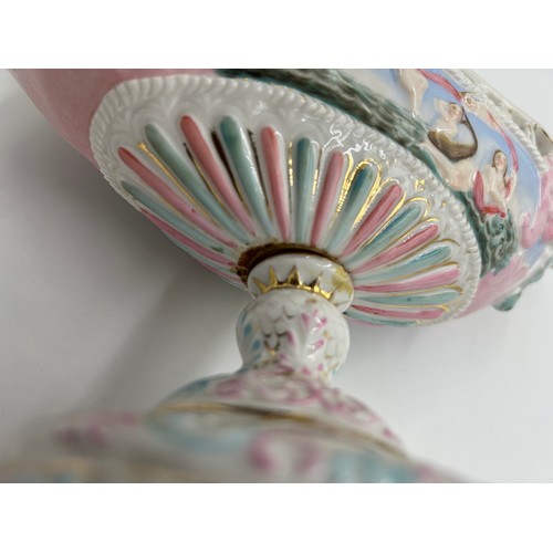 201 - A mixture of Continental ceramics to include a 19thC German boat shaped centre vase with dragon, che... 