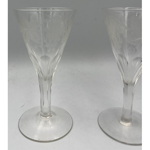 288 - Four 19thC glasses etched with grapes and vine leaves. 12.5cm h.