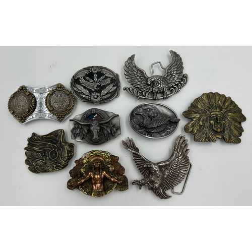 422 - Collection of 34 belt buckles, mainly in brass with Native American designs, eagles, motorbikes etc.