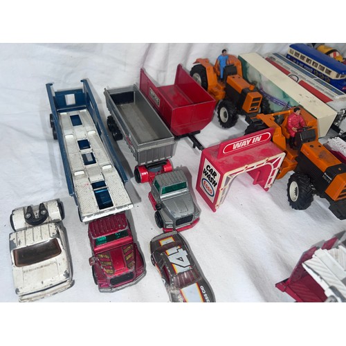 1146 - A collection of diecast vehicles to include Corgi, Britains MF 200 Massey Ferguson, Crescent Toys Se... 