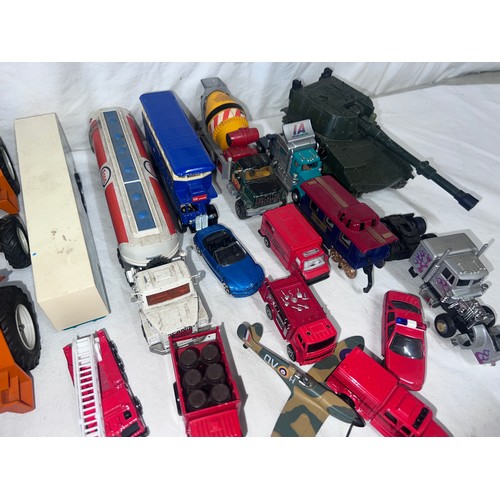 1146 - A collection of diecast vehicles to include Corgi, Britains MF 200 Massey Ferguson, Crescent Toys Se... 