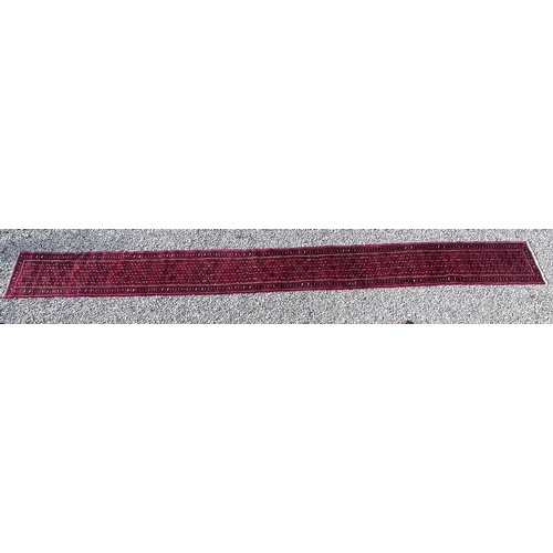 1101 - A very long hand made Iranian wool runner from Liberty of London 780cm x 75.5cm at widest.