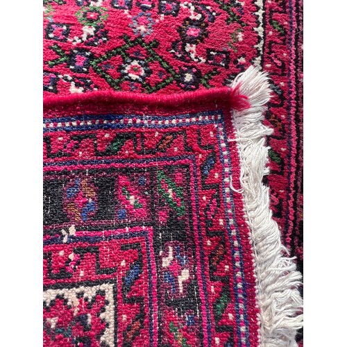 1101 - A very long hand made Iranian wool runner from Liberty of London 780cm x 75.5cm at widest.