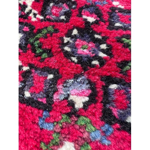 1101 - A very long hand made Iranian wool runner from Liberty of London 780cm x 75.5cm at widest.