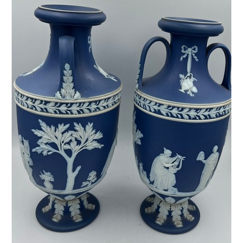 185 - A pair of Wedgwood Jasperware vases, 23cm h.