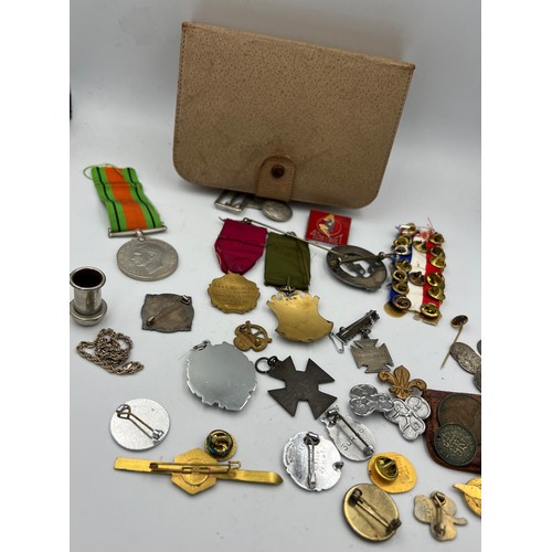 1300 - A collection of badges, medals, coins etc including hallmarked and silver Masonic, Boys Brigade, nur... 