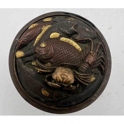 1301 - A Japanese brass and copper inkwell, 5.5cm h together with a brass lidded pot.