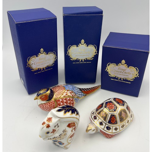 189 - Three Royal Crown Derby paperweights to include a squirrel, a tortoise and a pheasant. All with gold... 