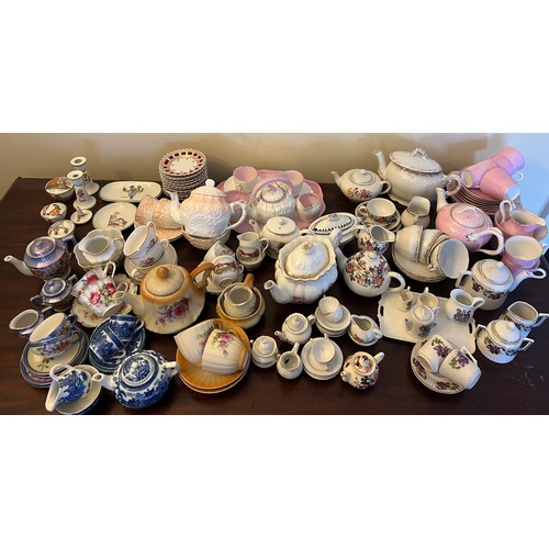 192 - A quantity of late 19thC and early 20thC children’s and doll’s tea services, ribbon plates etc.