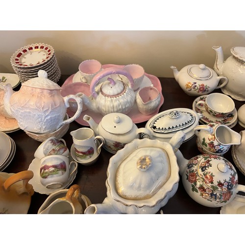 192 - A quantity of late 19thC and early 20thC children’s and doll’s tea services, ribbon plates etc.