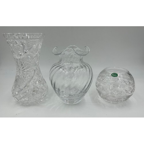 283 - A quantity of good quality cut glass comprising 4 vases, largest 27cm h, smallest Stuart 19cm h, an ... 