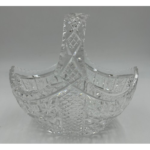 283 - A quantity of good quality cut glass comprising 4 vases, largest 27cm h, smallest Stuart 19cm h, an ... 