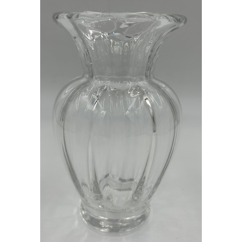 283 - A quantity of good quality cut glass comprising 4 vases, largest 27cm h, smallest Stuart 19cm h, an ... 