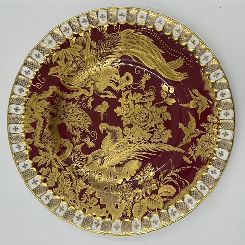 179 - A Royal Crown Derby Gold Aves pattern plate 26.5cm together with 4 other Royal Crown Derby red and g... 