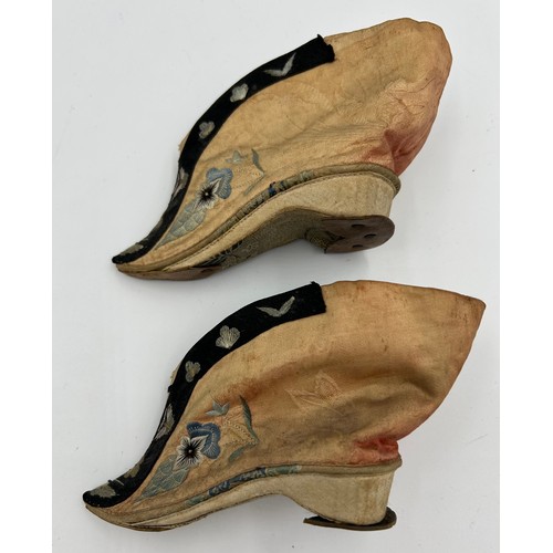 718 - Chinese silk embroidered foot binding lotus shoes.