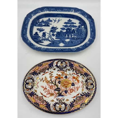 170 - Two 19thC platters to include Derby 32cm x 23cm and willow pattern, 38cm x 29cm.