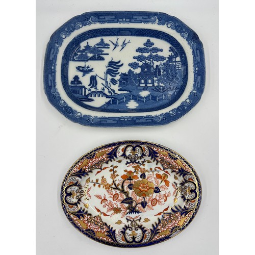 170 - Two 19thC platters to include Derby 32cm x 23cm and willow pattern, 38cm x 29cm.