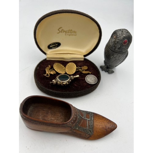 1305 - A miscellaneous lot to include ‘Take Courage’ cufflinks, watch key, early 19thC treen shoe, 1850 hal... 