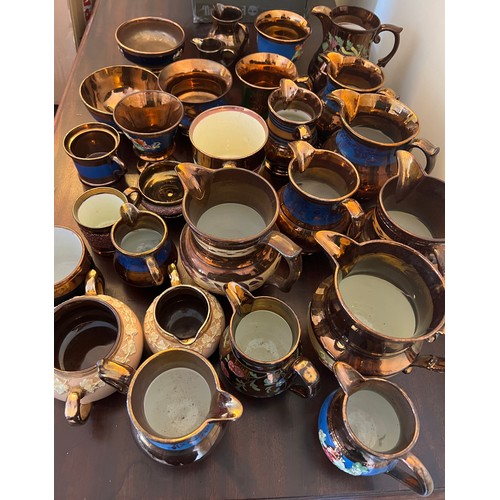 161 - A large quantity of mainly 19thC copper lustre ceramics.