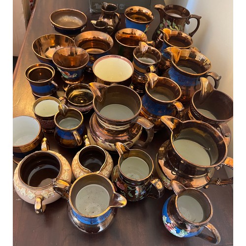 161 - A large quantity of mainly 19thC copper lustre ceramics.