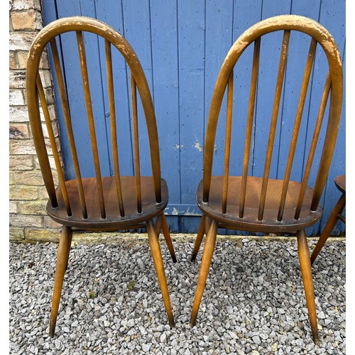 33 - Five Ercol Quaker stick back dining chairs 95cm back, 42cm seat.